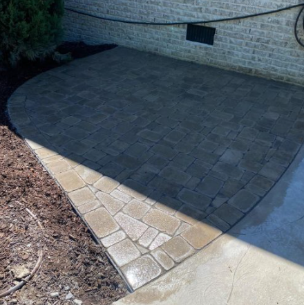 Paver patio with contrasting stone border