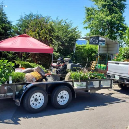 Lopez Landscaping Services equipment and plants arriving for a Nashville project